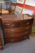 Late Georgian mahogany bow front chest of two short over three long drawers raised on splayed