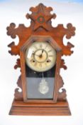 Late 19th century wooden mantel clock with Roman numerals to dial