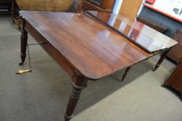 Large Victorian mahogany extending dining table on fluted legs with wind out action and additional