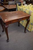 Georgian mahogany side table, the rectangular top over a long frieze drawer and a shorter side