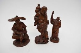 Group of three Chinese carved wooden figures of deities