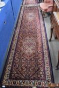 Pair of Super Keshan runner carpets, blue and red geometric and floral design, 90 x 350cm