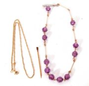Mixed Lot: amethyst bead necklace on yellow bar links (broken), a 375 chain and stick pin