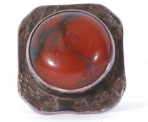 Large silver and agate designer ring, the round cabochon agate bezel set in a rectangular panel,