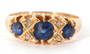 Antique 18ct gold sapphire and diamond ring featuring three graduated round cut faceted sapphires