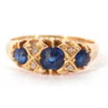 Antique 18ct gold sapphire and diamond ring featuring three graduated round cut faceted sapphires