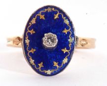 Vintage enamel and diamond set ring, the oval shaped blue enamel plaque centring an old cut diamond,