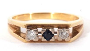 18ct gold sapphire and diamond ring centring a small round cut sapphire, flanked by two small