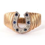 9ct gold diamond and sapphire horseshoe ring, the horseshoe alternate set with small diamonds and