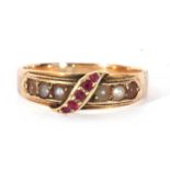 Victorian 15ct gold ruby and seed pearl ring, the centre applied with a band of graduated rubies