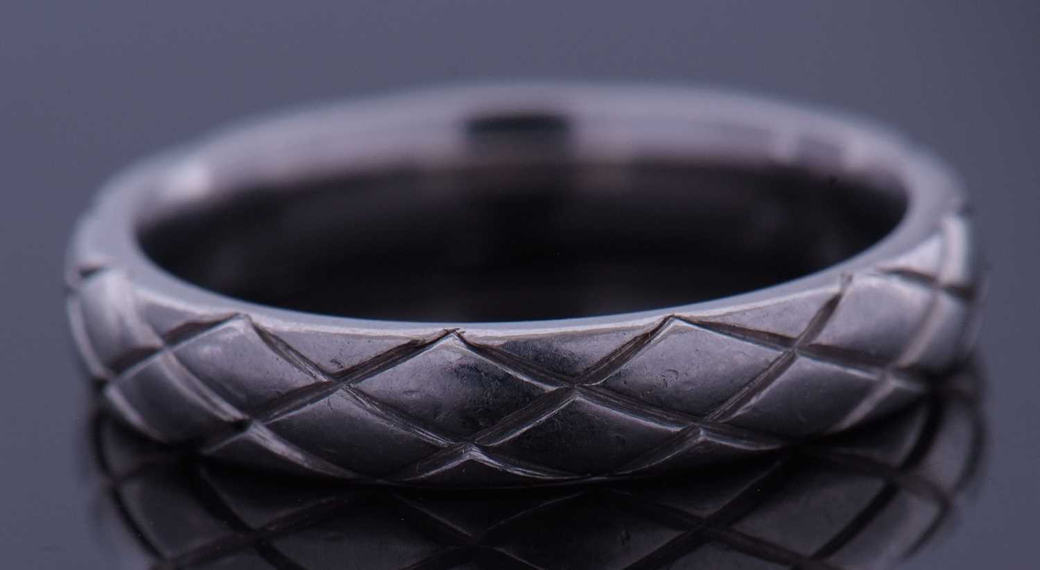 A platinum band engraved with a geo-metric design, 5.2gms finger size J - Image 3 of 3