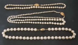 Three rows of modern simulated pearls, each with a 375 stamped box clasp fitting