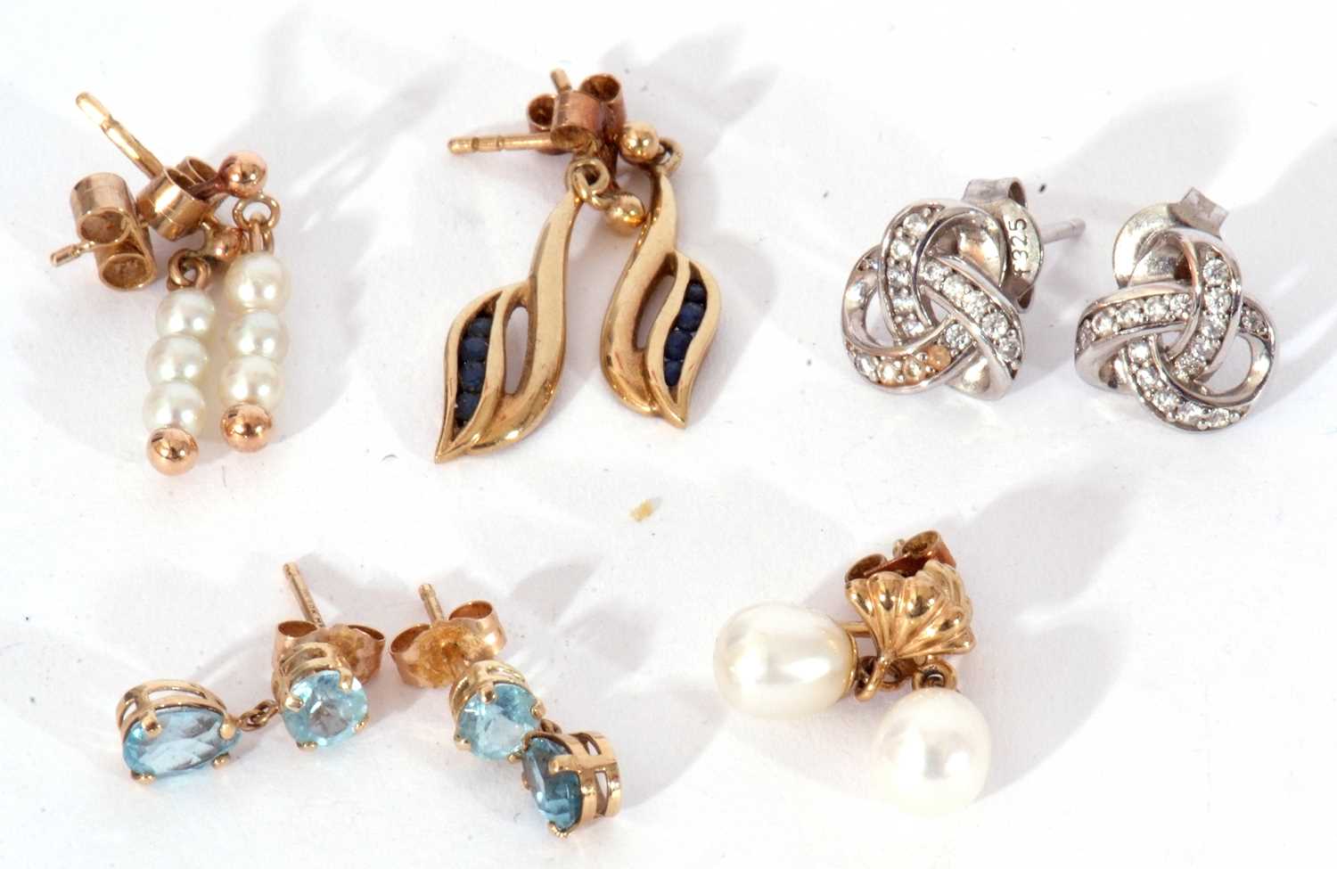 Mixed Lot: two pairs of pearl set earrings and three pairs of paste earrings