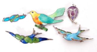 Mixed Lot: sterling silver and enamel bird on a branch brooch, two enamelled bird brooches, together