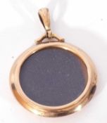 9ct gold open face locket with glazed panel to front, suspended on a plain bale, Birmingham 1905,