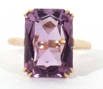 9ct gold and amethyst ring, the rectangular cut faceted amethyst, 15 x 10mm, raised in a basket