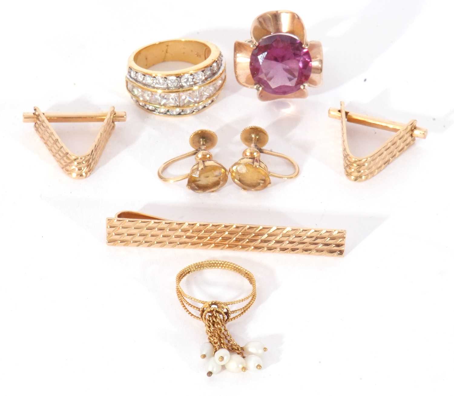 Mixed Lot: yellow metal and amethyst dress ring, a cubic zirconia dress ring, a pair of citrine