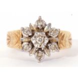 18ct gold and diamond cluster ring, a flowerhead design featuring seven small diamonds, each