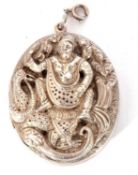 Modern Eastern white metal locket of oval form, the front embossed with a figure and snakes, 45 x