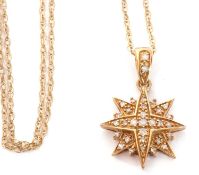 9ct gold starburst pendant highlighted throughout with small graduated single cut diamonds, 15mm