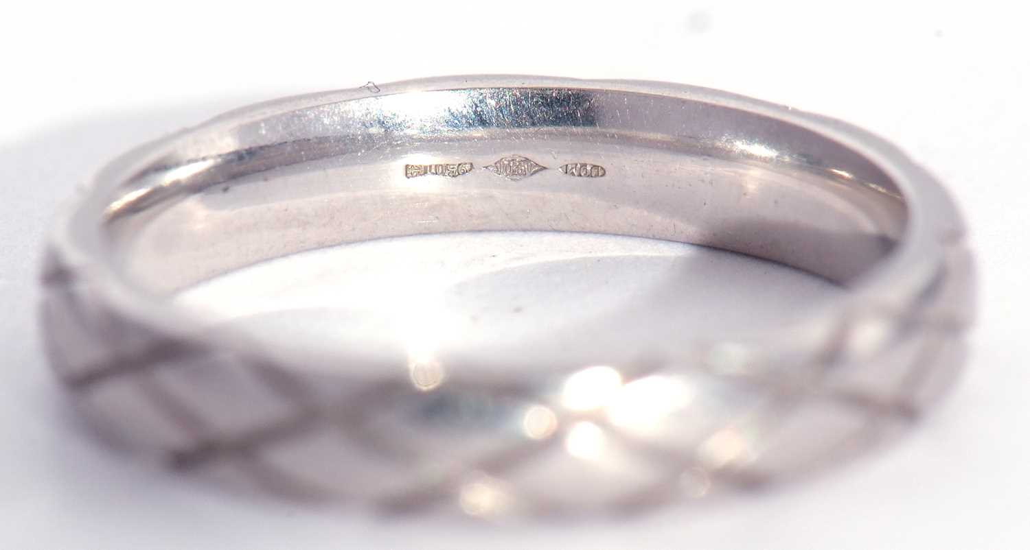 A platinum band engraved with a geo-metric design, 5.2gms finger size J - Image 2 of 3