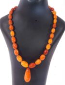 Amber bead necklace, choker style, with a pear drop amber dropper below, 23cm long, g/w 26.8gms