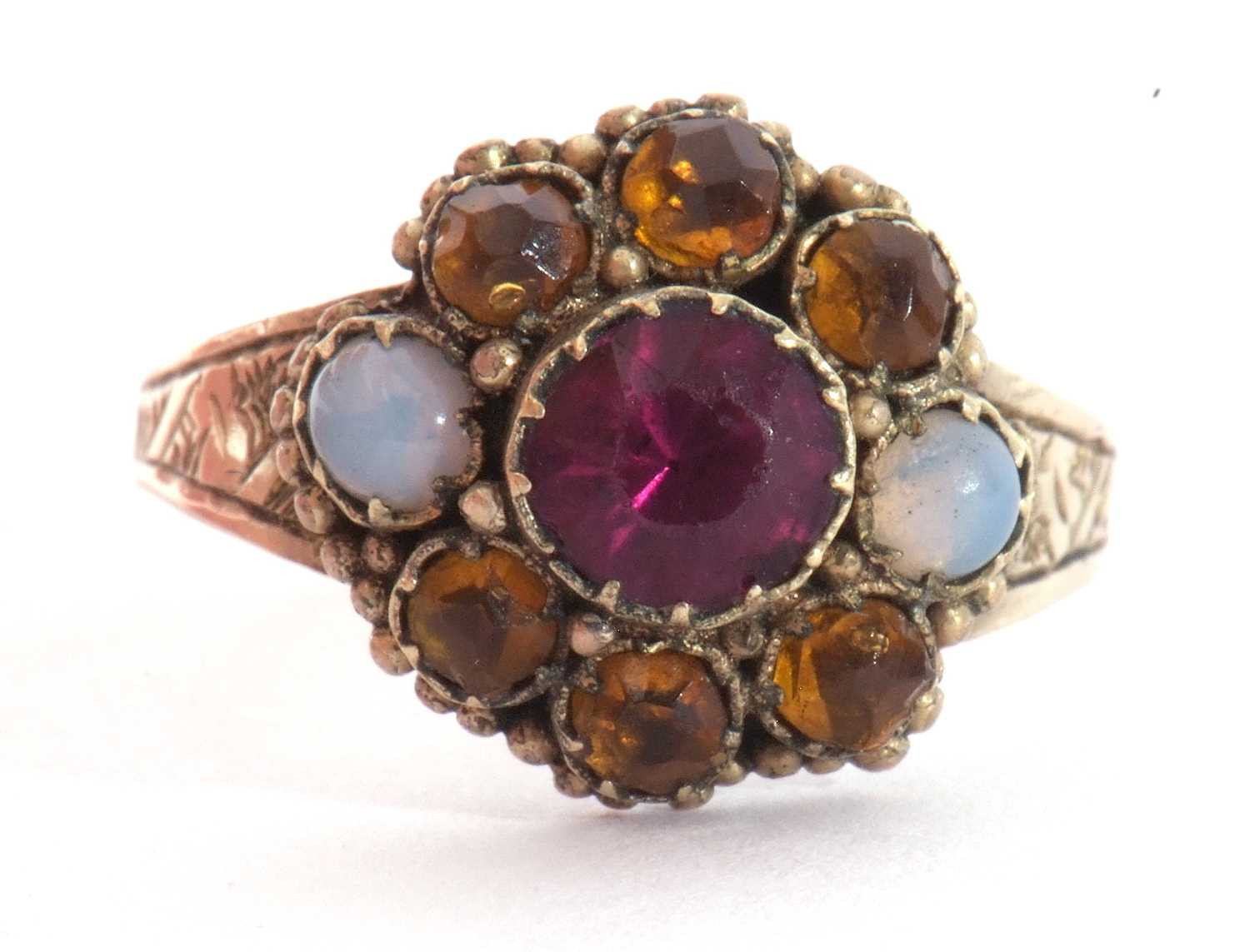 Antique cluster ring set with two small opals. orange and pink stones, raised between engraved - Image 2 of 8