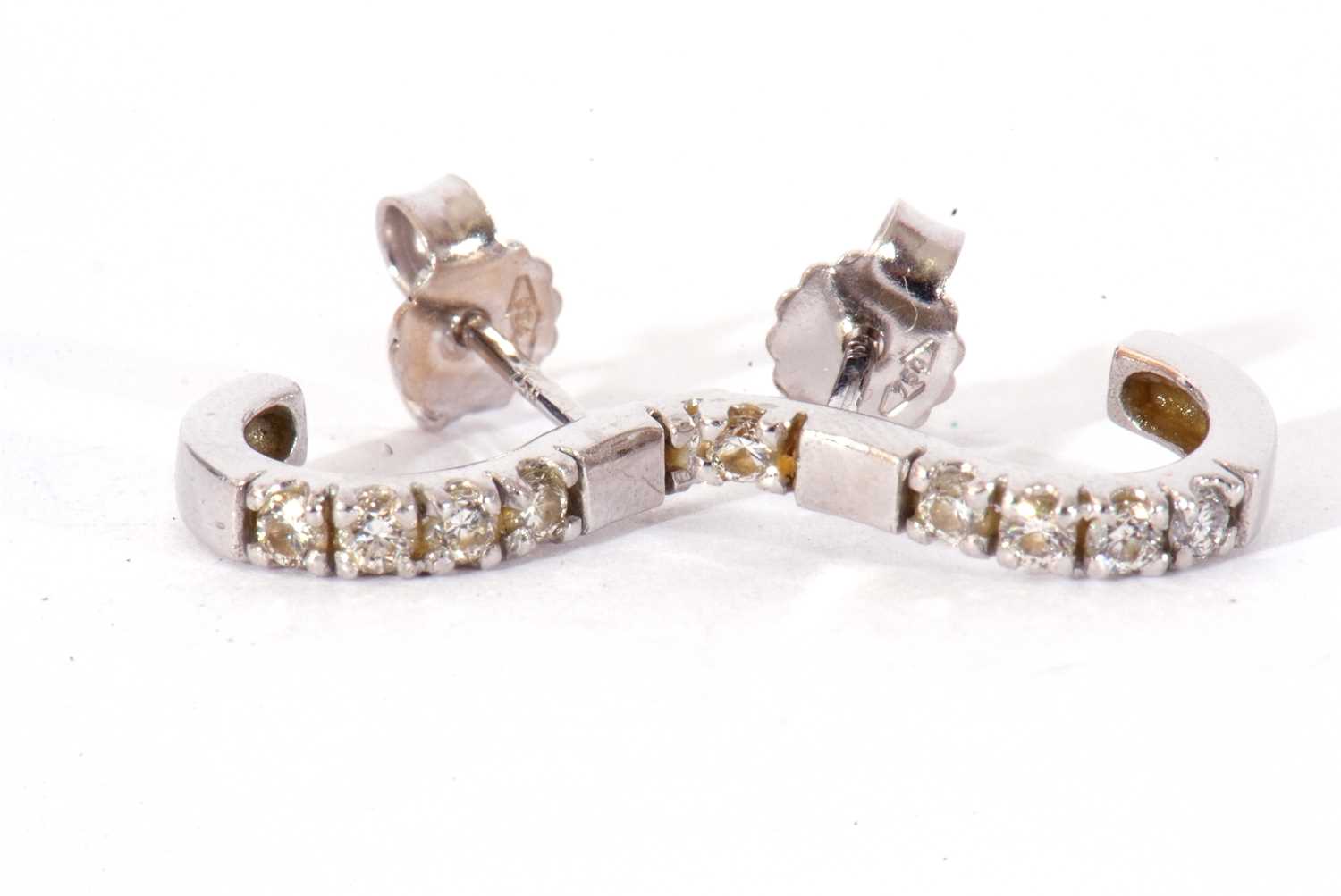 Pair of diamond set half hoop earrings, each set with five small single cut diamonds, post fittings, - Image 2 of 4
