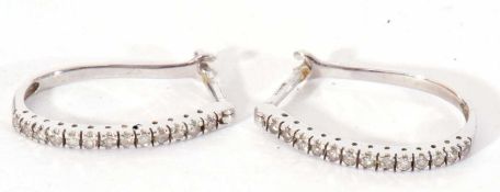 Pair of modern white 9ct gold diamond half set half hoop earrings, post and clip fittings