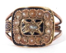 Antique mourning ring, the square black enamel panel decorated through with seed pearls and raised