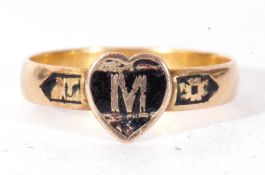 Antique mourning ring, the centre applied with a heart black enamel panel centring a letter 'M', the