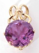 Modern 9ct gold hallmarked amethyst drop pendant, 12mm diam, suspended from a ribbon bale, stamped