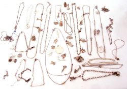 Mixed lot of mainly white metal jewellery to include zodiac pendants, charms, bracelets, necklaces