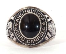 Graduation ring centring an oval cabochon onyx panel, dated 1980, marked 'Archbishop John Carroll,