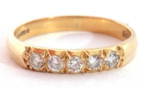 18ct gold five stone diamond ring, line set with five small brilliant round cut diamonds, 0.25ct