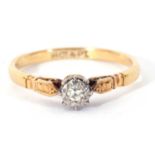 Single stone diamond ring featuring a small single cut diamond in an illusion setting, stamped