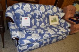 PLUMBS BLUE FLORAL UPHOLSTERED THREE SEATER SOFA