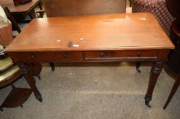 VICTORIAN MAHOGANY TWO DRAWER SIDE TABLE ON FLUTED LEGS, 121CM WIDE