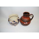 WEST GERMAN POTTERY JUG, TOGETHER WITH A FLORAL DECORATED JARDINIERE (2)