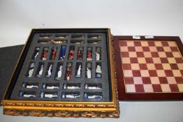 MODERN LACQUERED CHESS BOARD WITH COLLECTION OF RESIN FIGURES