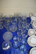 LARGE QUANTITY OF DRINKING GLASSES, GLASS BOWLS ETC