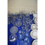 LARGE QUANTITY OF DRINKING GLASSES, GLASS BOWLS ETC