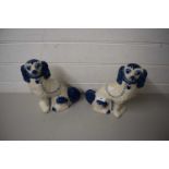 PAIR OF MODERN STAFFORDSHIRE BLUE AND WHITE MODEL SPANIELS