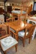 MODERN DUCAL PINE KITCHEN TABLE ON TURNED LEGS TOGETHER WITH FOUR CHAIRS (5)