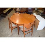 G-PLAN TEAK CIRCULAR EXTENDING DINING TABLE AND FOURS CHAIRS (5)