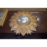 EARLY 20TH CENTURY CONVEX WALL MIRROR IN STARBURST FRAME