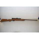 A VINTAGE AIR RIFLE WITH SCOPE