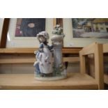 LLADRO MODEL OF A GIRL PICKING FLOWERS