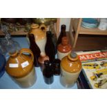 MIXED LOT: VARIOUS ASSORTED FLAGONS, GINGER BEER BOTTLE, GLASS BOTTLES ETC