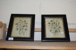 PAIR OF SMALL 19TH CENTURY NEEDLEWORK PICTURES OF FLOWERS SET IN EBONISED FRAMES